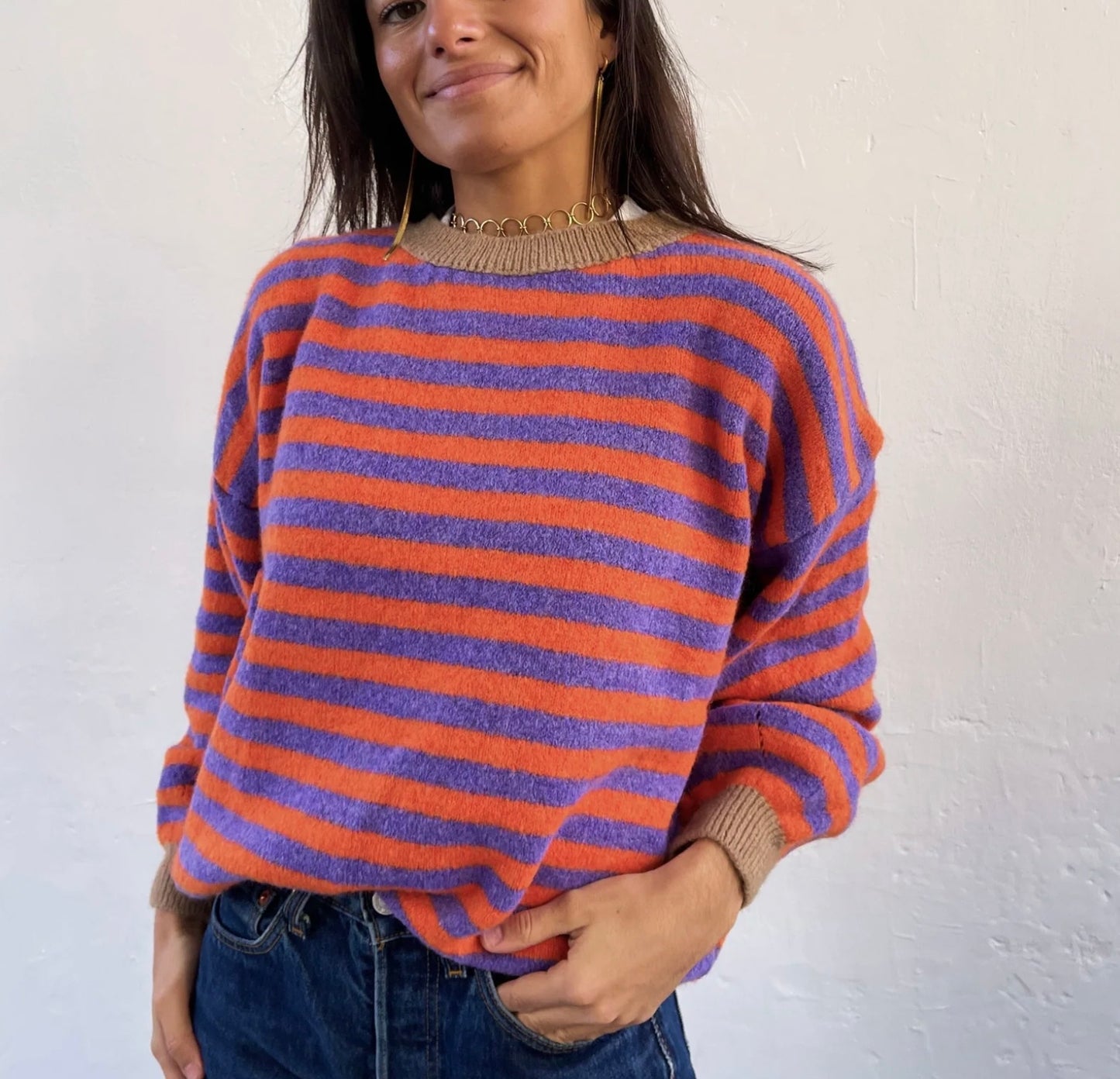 Orange and purple striped jumper