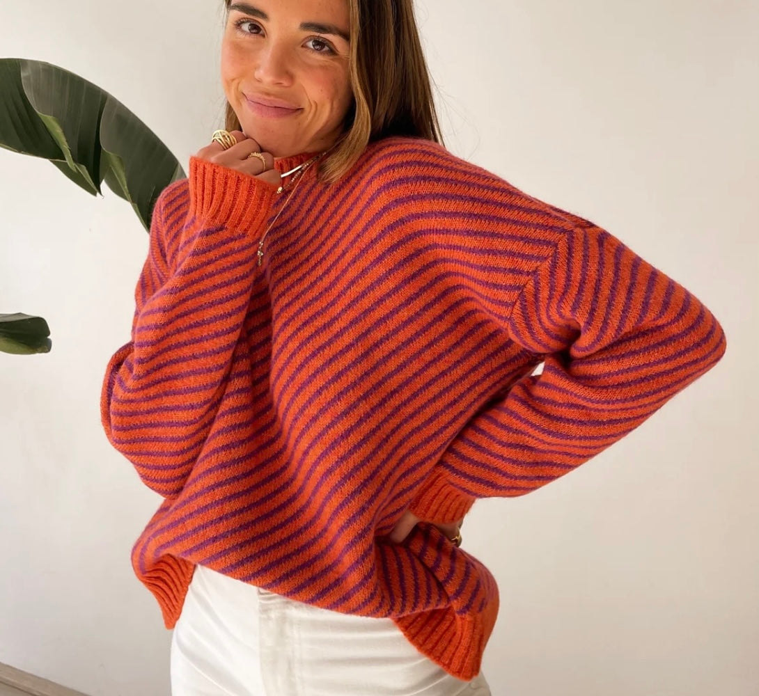 Orange and purple diagonally striped jumper