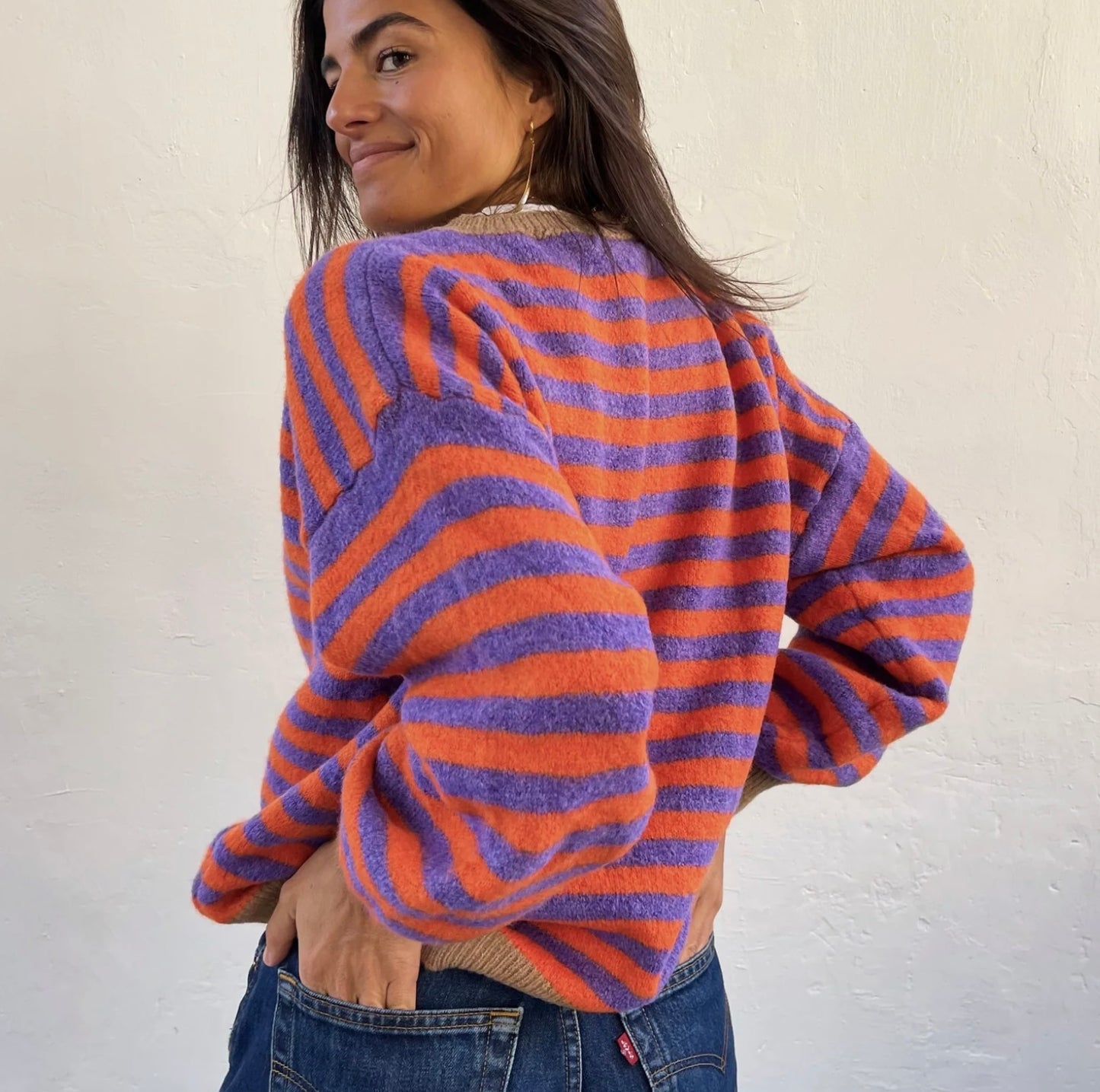 Orange and purple striped jumper